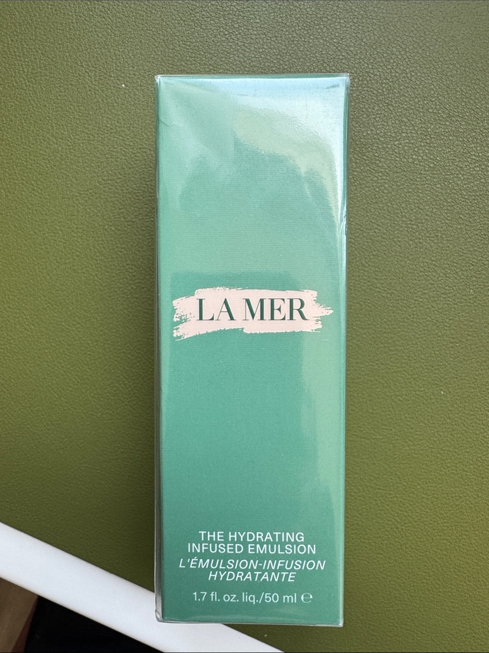 La Mer Hydrating Emulsion in Aqua Green Packaging